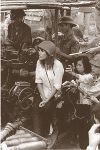 Jane photo-ops with North Vietnamese anti-aircraft crew